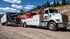 Towing Corona heavy-duty towing service recovering a disabled semi-truck with a heavy wrecker.