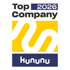 Ein goldenes und blaues Logo mit der Aufschrift „Top Company 2026“ und dem Wort „kununu“ in weißer Schrift.