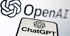 Das Bild zeigt das OpenAI-Logo und den Schriftzug "OpenAI" im Hintergrund. Im Vordergrund ist ein mobiles Gerät oder Bildschirm zu sehen, das das ChatGPT-Logo mit dem dazugehörigen Schriftzug "ChatGPT" darstellt. Beide Logos sind identisch und bestehen aus einem abstrakten, spiralförmigen Knotendesign. Der Fokus liegt auf dem Vordergrund, während der Hintergrund leicht unscharf ist. Das Bild ist in Schwarz-Weiß gehalten.