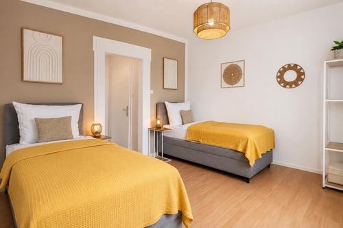 Zweites Schlafzimmer der Ferienwohnung Großostheim mit zwei getrennten Einzelbetten