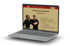 Ein MacBook-Laptop zeigt die Webseite "Shinden Dojo Osnabrück" mit Karate-Kämpfern und Text.