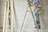 high-ladder-as-support-carpenter-worker