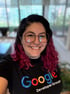 picture of a Kaky smiling with a Google Developers group