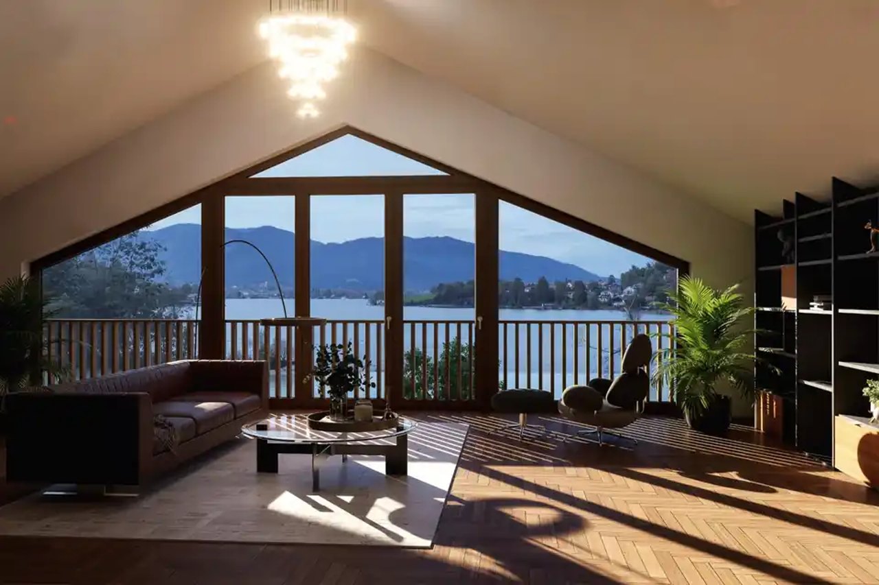 Visualisierung: Wohnraum mit Giebelverglasung und Blick über den Tegernsee