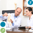 Chiropractor showing spine model, showcasing chiropractic biophysics benefits