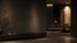Modernes, dunkel gestaltetes Wohnzimmer mit strukturierter Wand, Lowboard und gedimmter Beleuchtung im Hintergrund.