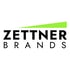 Schwarzer Text "ZETTNER BRANDS" mit grünem Balken darüber auf weißem Hintergrund.