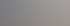 Luftaufnahme einer weitläufigen Fabrikanlage mit Nebel und Bäumen.