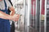 hand-car-mechanic-with-wrench-auto-repair-garage