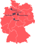 Karte von Deutschland in Rot mit weißen Umrissen der Bundesländer auf grünem Hintergrund.