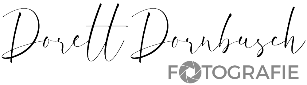 Dorett Dornbusch Fotografie-Logo mit Kamera-Symbol.