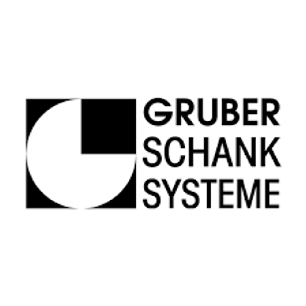 Das Logo von Gruber Schank Systeme zeigt einen weißen Kreisviertel in einem schwarzen Quadrat, daneben steht der Text "GRUBER SCHANK SYSTEME".