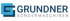 Blaues Logo mit einem stilisierten "G" und dem Text "GRUNDNER SONDERMASCHINEN".