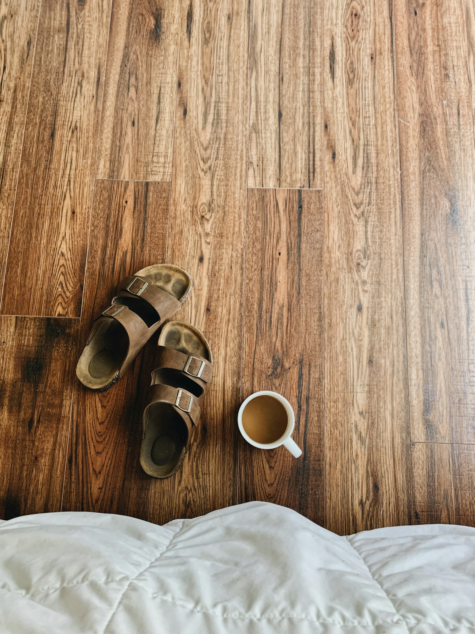 Click-lock laminate flooring running through a bright hallway