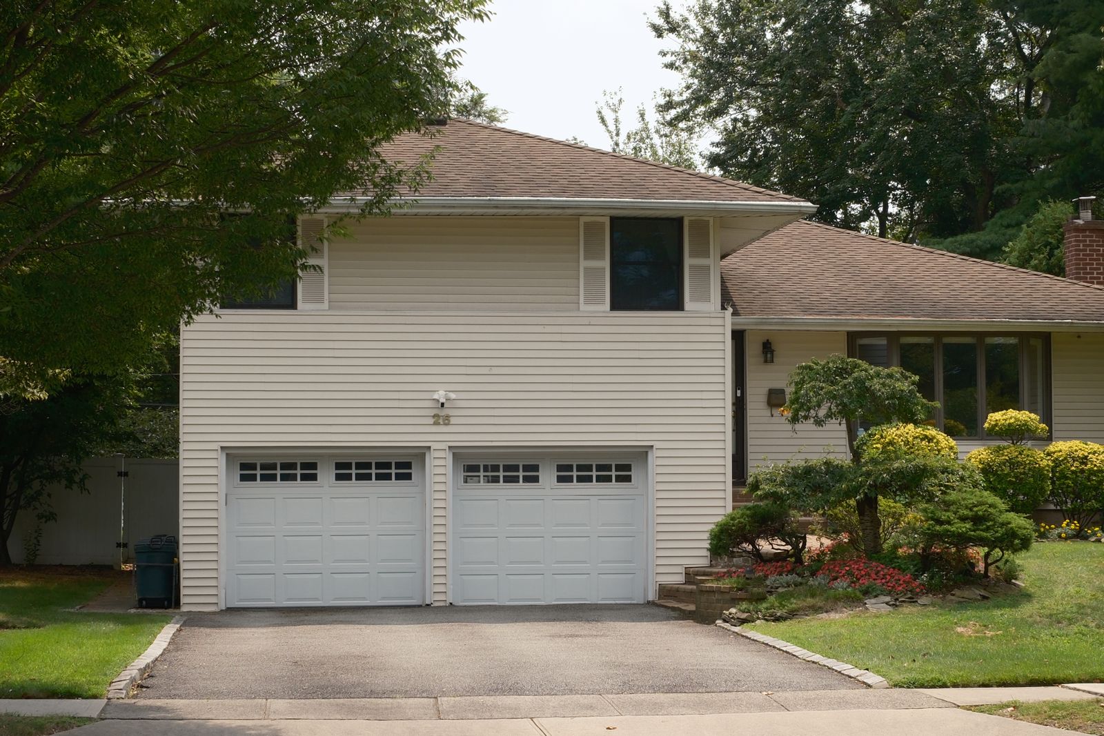 Single-family home with a pitched roof and attached garage