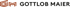 Logo mit orangefarbenem "GM" und schwarzem Text "GOTTLOB MAIER" auf grünem Hintergrund.