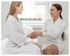 Primary care doctor consulting with female patient during wellness checkup at Glendale clinic.