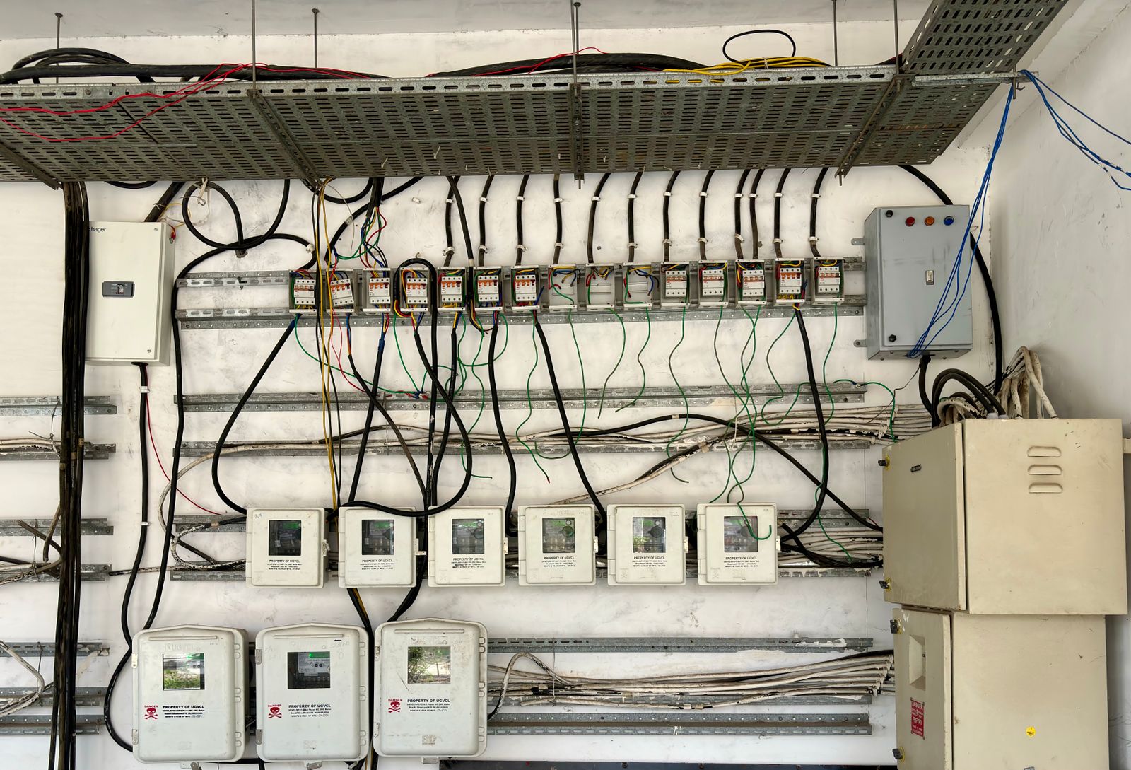 A new 200-amp load centre with neatly dressed circuits and a labelled directory, cover off.