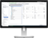 ERP-Softwareoberfläche auf einem Dell-Monitor zur Bearbeitung von Fertigungsaufträgen mit Tabellen und Datenfeldern.