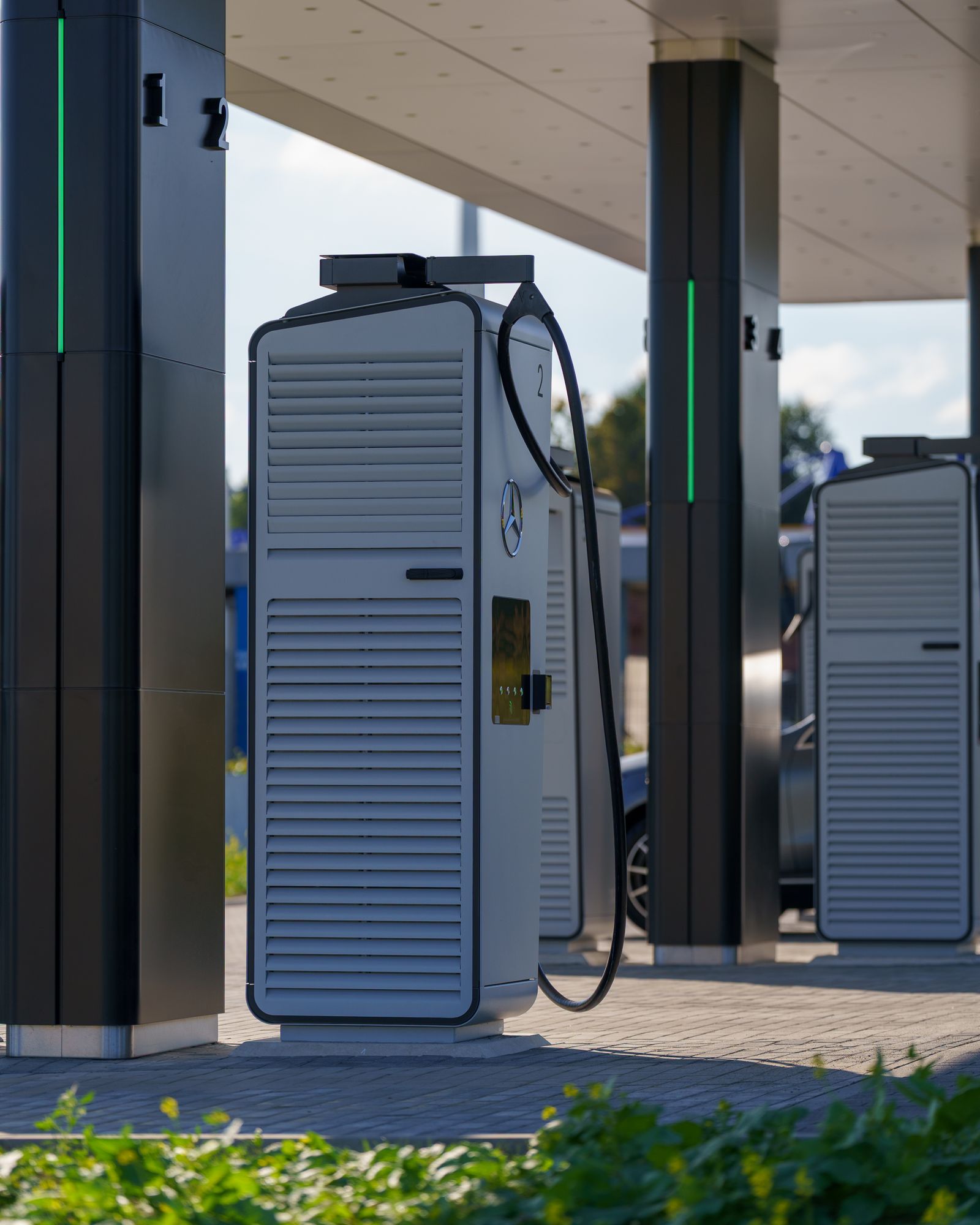Outdoor-mounted electric vehicle charging station