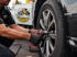 Towing Eastvale flat tire change service using a professional impact wrench to safely replace a vehicle tire during roadside assistance