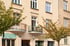 Historic building facade on Miodowa street