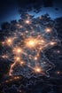 Deutschlandkarte bei Nacht mit leuchtenden Städten und verbundenen Lichtlinien, die ein Netzwerk bilden.