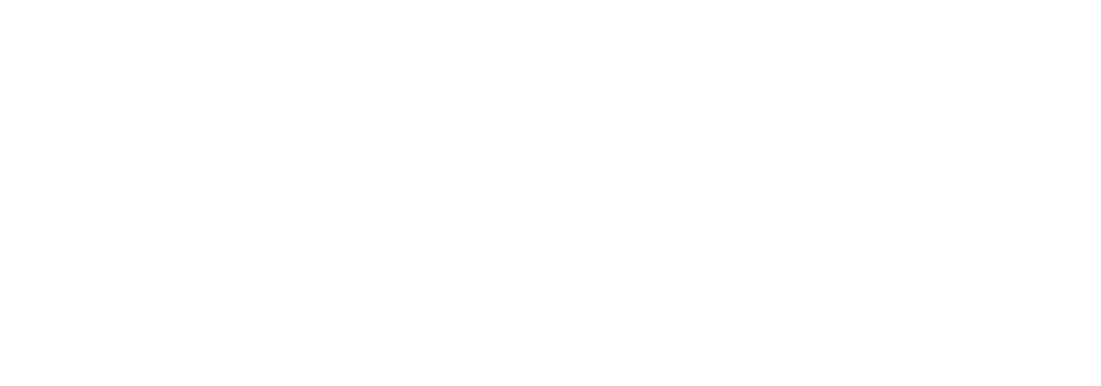 Der weiße Text "Anka Krätzig" mit einem Baumlogo zwischen den Wörtern auf einem grünen Hintergrund.