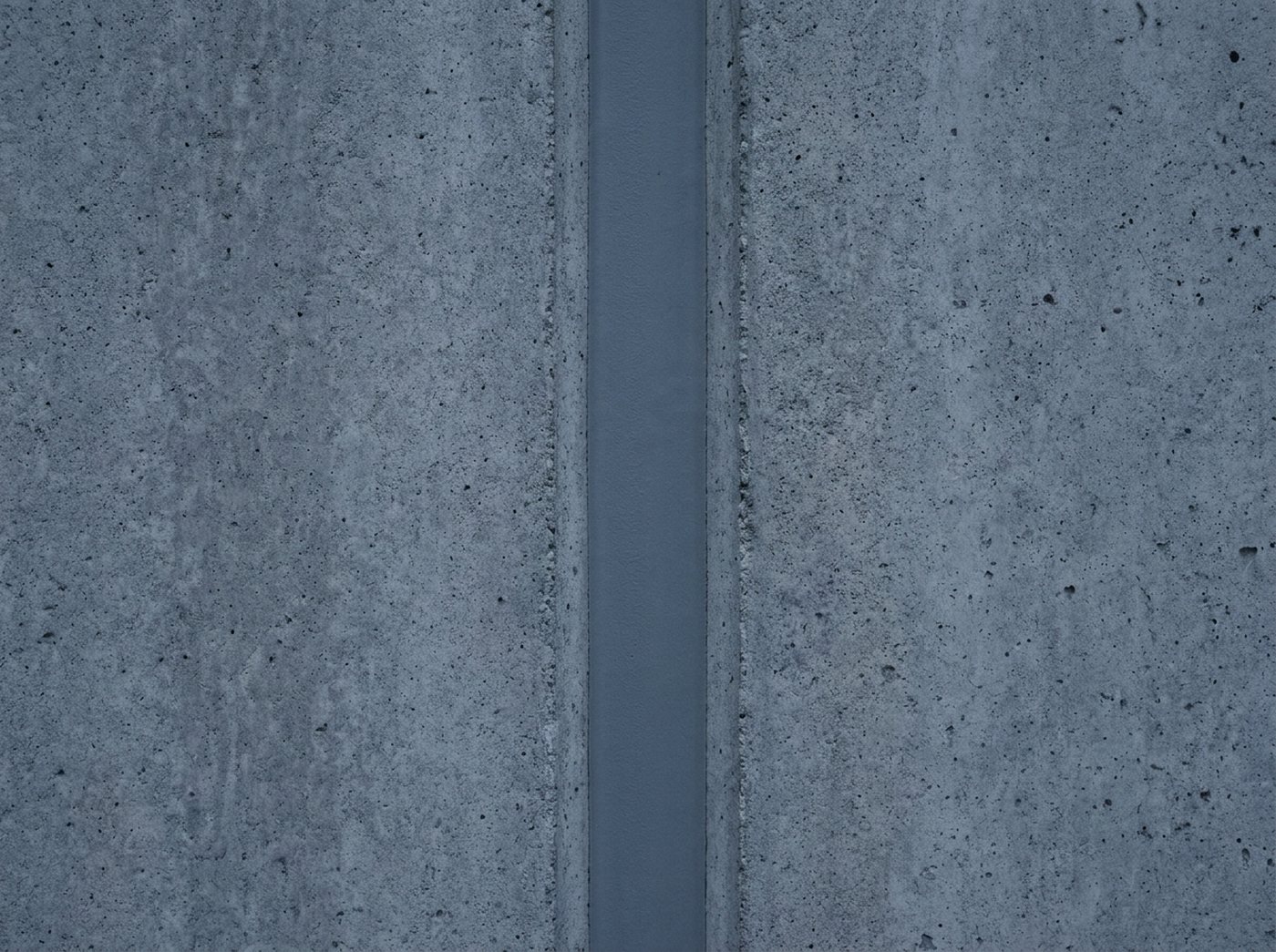 Gleichmässig gezogene elastische Fuge zwischen zwei Betonfassadenelementen