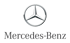 Mercedes-Benz Logo mit silbernem Stern in einem Kreis und dem Schriftzug "Mercedes-Benz" darunter.