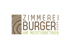 Von der Firma Zimmerei Burger GmbH: Logo mit Jahresring-Grafik, braunem Schriftzug und grünem Zusatz "Ihr Meisterbetrieb"