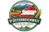 Logo Österreichweit Beratung für Landwirte mit Österreich-Karte, Alpenpanorama und Weizenähre.