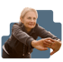 Mature woman stretches forward, reflecting rejuvenation from biologic therapy.