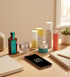 Desk arrangement with beauty products and a smartphone representing social media and influencer marketing