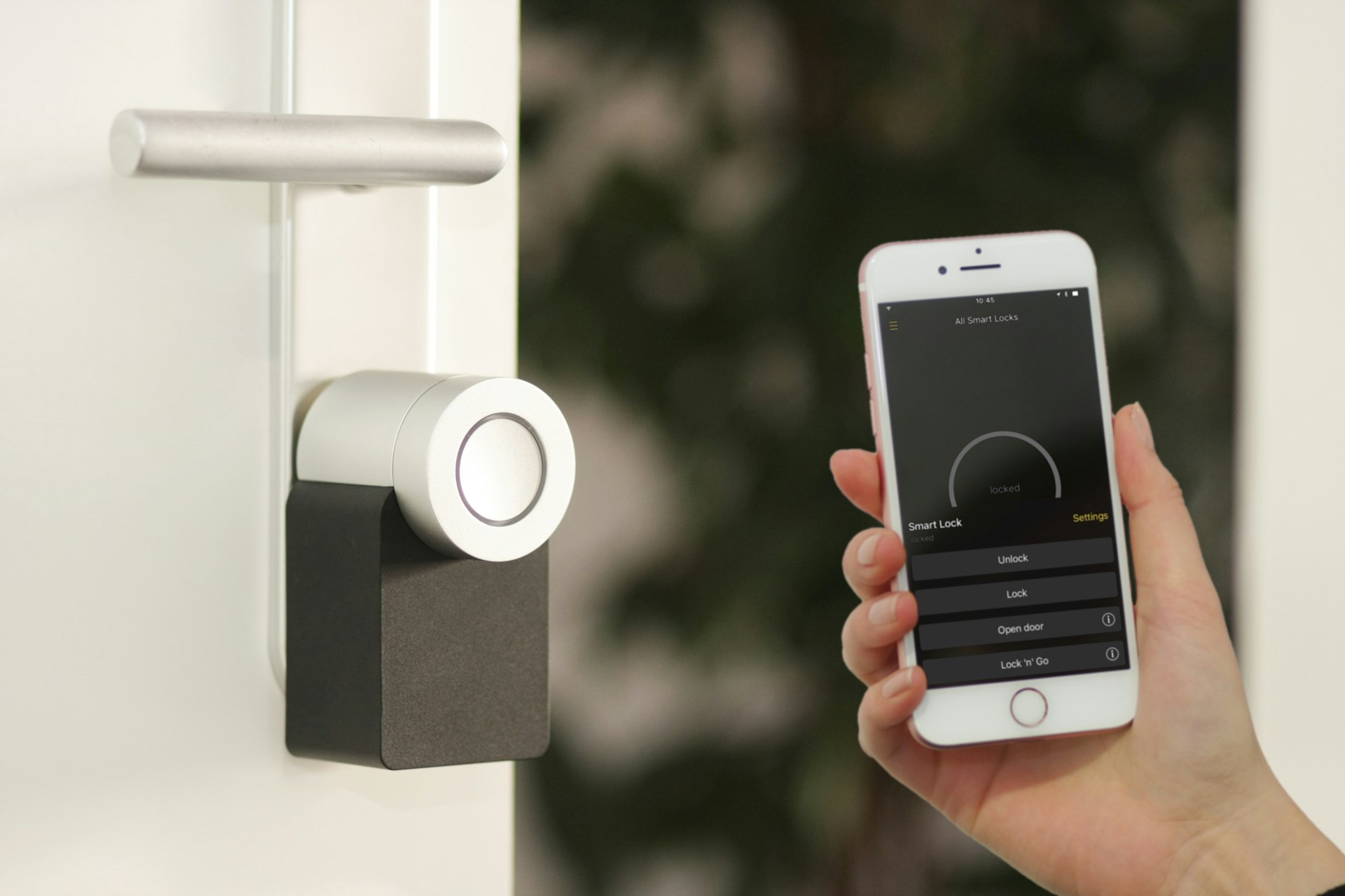 A keypad smart lock being controlled from a phone at a San Mateo front door