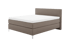 Dunkelgraues Boxspringbett mit gestepptem Kopfteil und weißer Matratzenauflage.