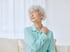 Older woman holding her painful shoulder — regenerative joint care at Accelerated Medical in Elko, NV