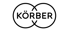 Körber Firmenlogo in weißer Umrissgrafik mit zwei ineinandergreifenden Kreisen auf schwarzem Hintergrund.