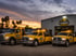 Towing Eastvale fleet of professional tow trucks ready for 24/7 emergency towing service outside the company headquarters