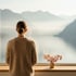 Blick aus dem Praxisfenster auf See und Berge
