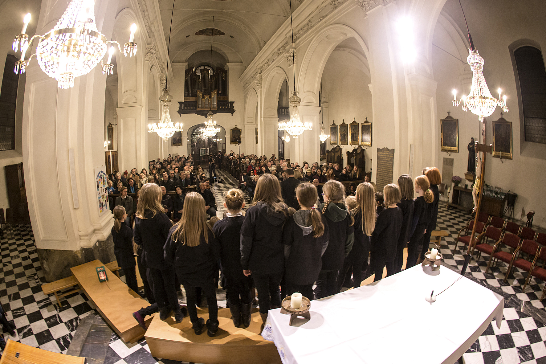 Young singers of the Kinderchor der VS St. Peter on stage at the Mariahilferkirche opening concert, Voices of Spirit 2017, Graz