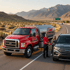 Towing Sandy fuel delivery service providing emergency gas to a stranded SUV driver on a roadside in Sandy, Utah.