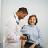 Patient having blood pressure checked by healthcare provider during routine hypertension screening

