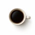 White coffee cup on a white surface.