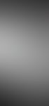 Raue, weiße Betonwand mit unregelmäßigen, erhabenen Texturen und einem Lichtstrahl von links unten.