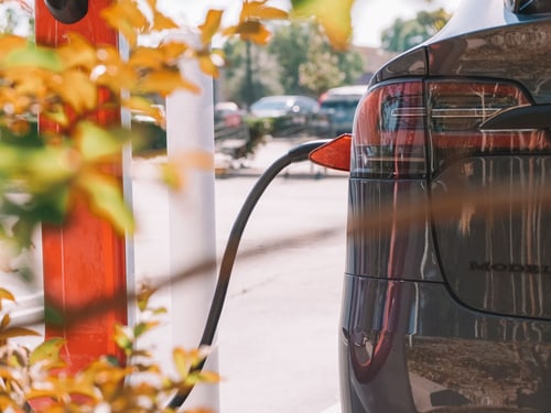 are smart EV chargers worth it, a smart Level 2 EV charger with an app display charging an electric car in Yorba Linda, CA
