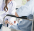Doctor examining patient’s knee to identify pain source