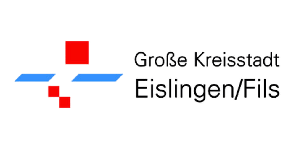 Logo von Lügde: Rote Skyline, blauer Hügel, Schriftzug "Lügde Staatlich anerkannter Erholungsort".