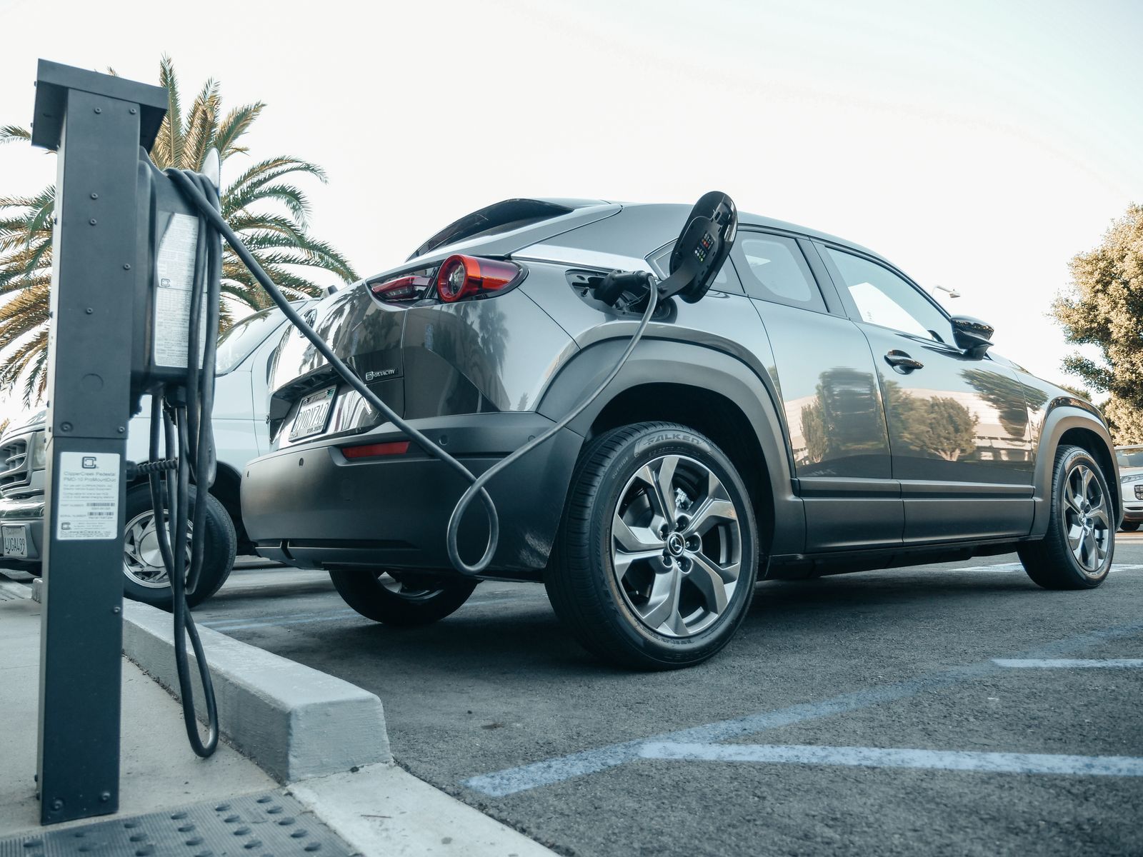 Electric car parked in a charging bay