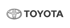 Toyota logo with a silver oval emblem and "TOYOTA" text in dark gray.